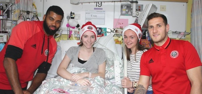 Sheffield United players with patient