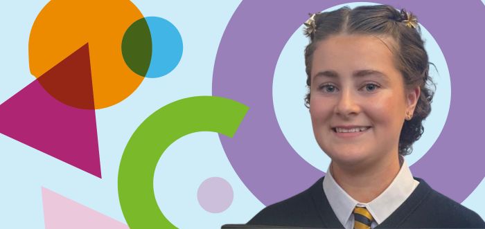 girl smiling in school uniform